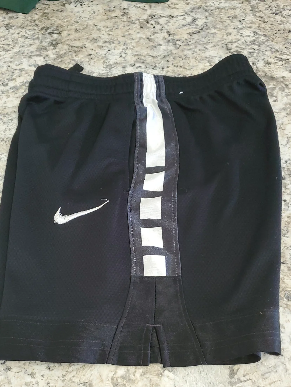 NIKE KIDS Black Athletic Shorts with White Swoosh